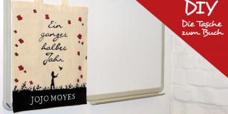 Ein ganzes halbes Jahr, Jojo Moyes: Tasche an Wand hängend