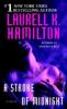A Stroke of Midnight - Laurell K. Hamilton